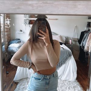 nude turtle neck crop